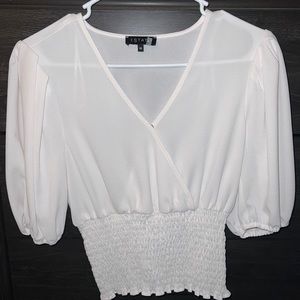 Sheer white top only worn once.